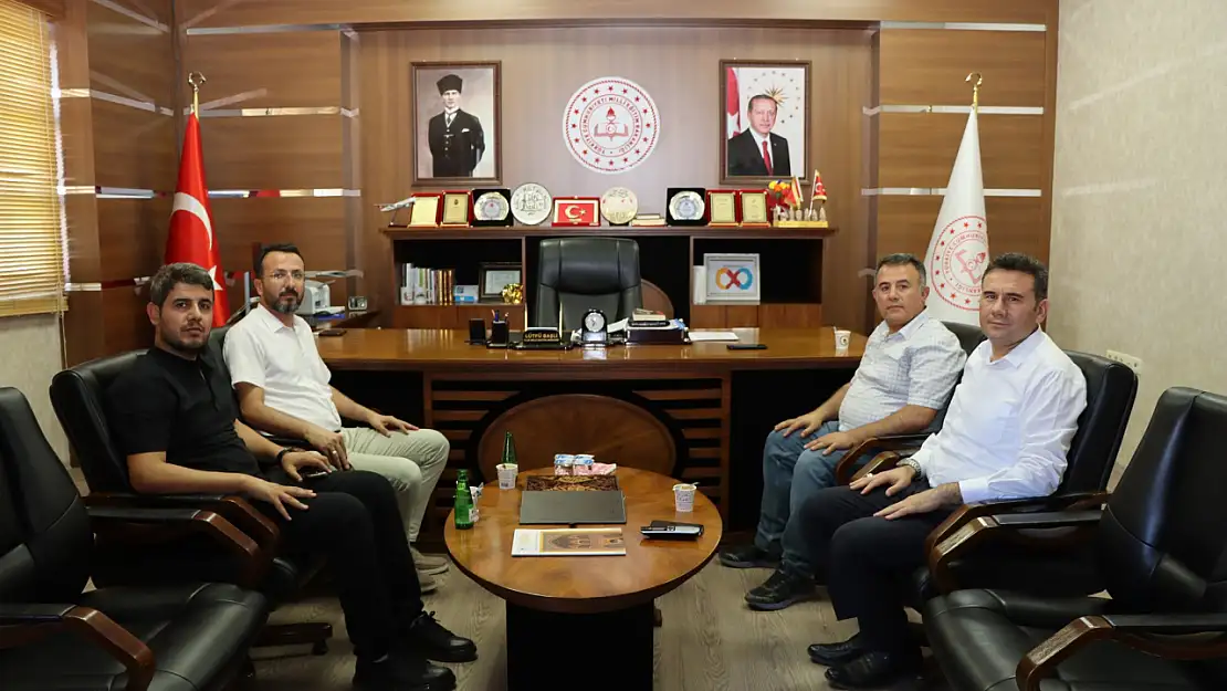 Başhekim Akel'den Başli'ya ziyaret