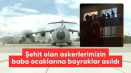 Gürcistan'da düşen uçakta şehit olan askerlerimizin baba ocaklarına bayraklar asıldı