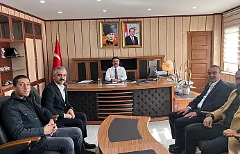 Başkan Doğan ve beraberindeki heyetten Kaymakam Aslan'a ziyaret