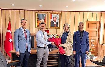 Besni PTT İlçe müdürlüğü heyetinden Kaymakam Aslan'a ziyaret