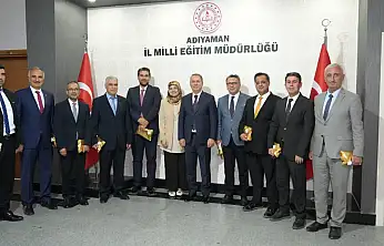 Tosun Milli Eğitim yöneticilerinin öğretmenler gününü kutladı