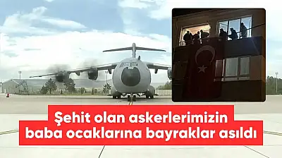 Gürcistan'da düşen uçakta şehit olan askerlerimizin baba ocaklarına bayraklar asıldı