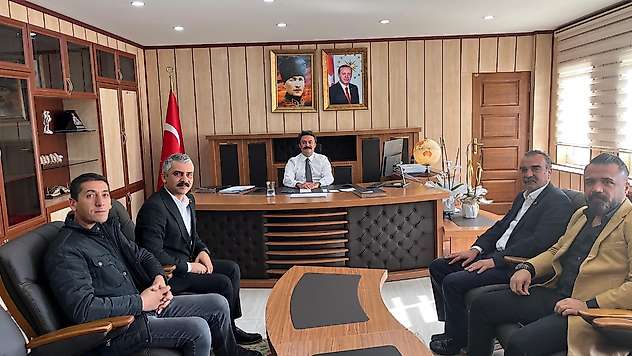 Başkan Doğan ve beraberindeki heyetten Kaymakam Aslan'a ziyaret