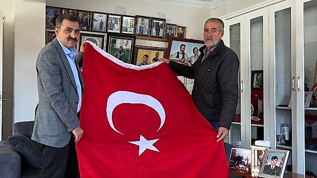 Başkan Ertürk'ten Şehit Babası İmam Sarıaslan'a  ziyaret