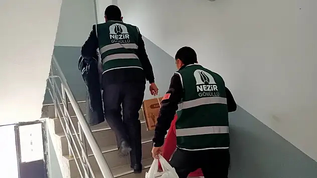 Nezir Derneği'nden kış desteği: konteyner ve hanelere giyim yardımı