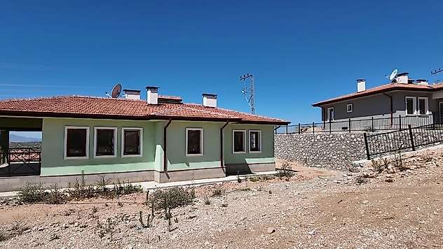 Osmaniye'de yapımı tamamlanan 89 köy evinin anahtar teslimi yapıldı