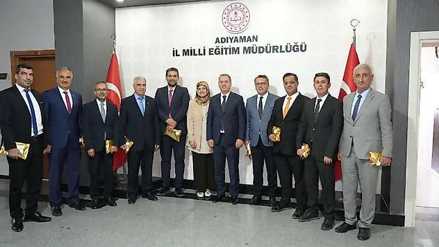 Tosun Milli Eğitim yöneticilerinin öğretmenler gününü kutladı