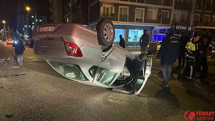 İki otomobilin çarpışması sonucu araçlardan biri ters döndü