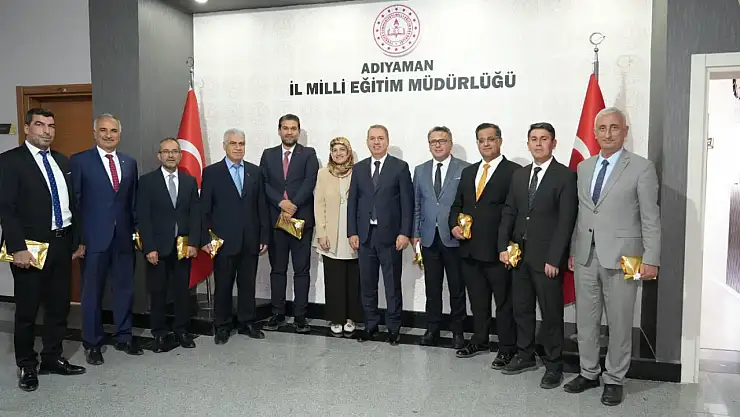 Tosun Milli Eğitim yöneticilerinin öğretmenler gününü kutladı