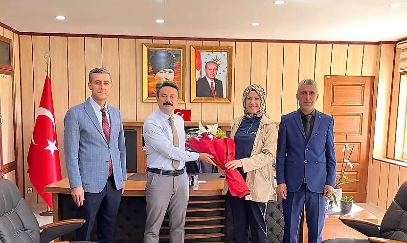 Besni PTT İlçe müdürlüğü heyetinden Kaymakam Aslan'a ziyaret
