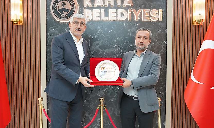 Kitap Fuarı ve Kerge Festivali için Başkan Hallaç'a Plaket