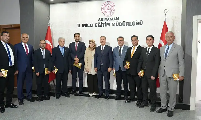 Tosun Milli Eğitim yöneticilerinin öğretmenler gününü kutladı